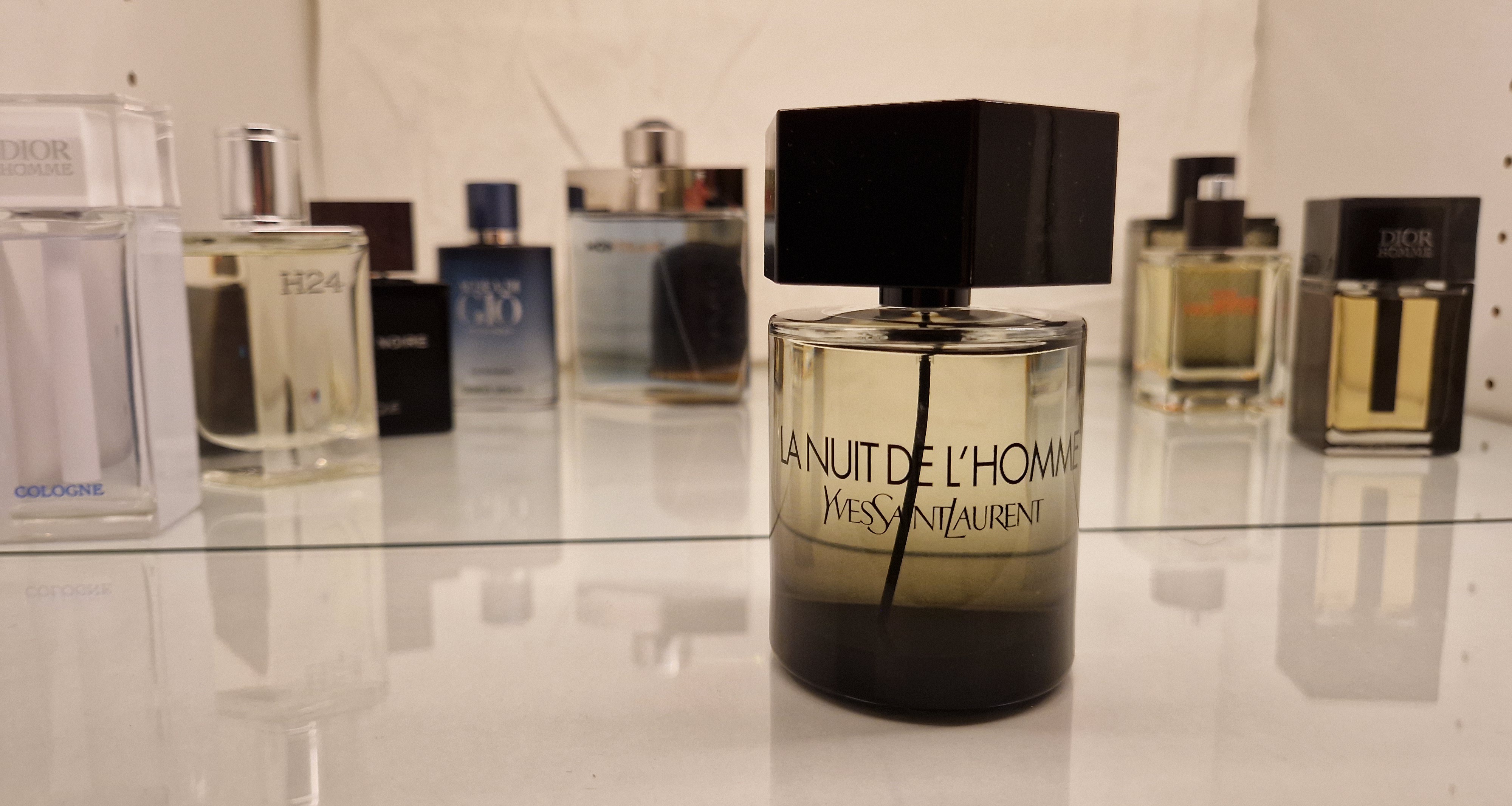 A collection of cologne bottles displayed neatly